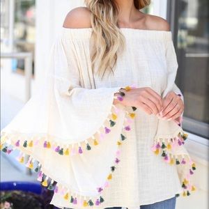 White top with Pom Pom sleeves NWOT